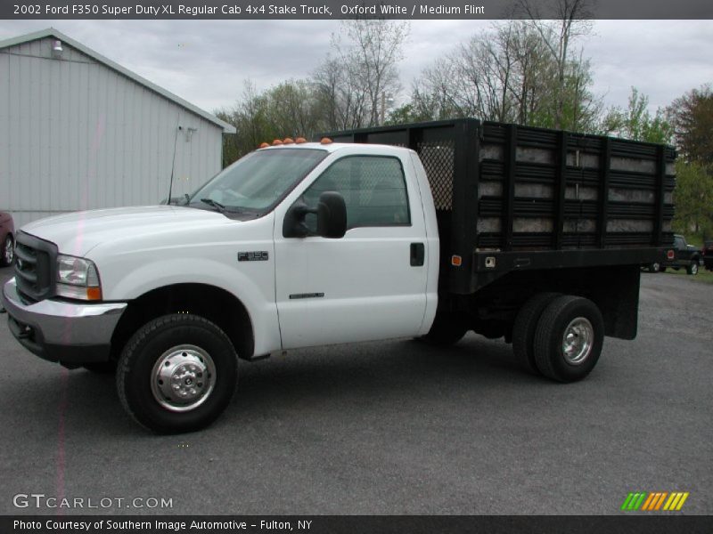 Oxford White / Medium Flint 2002 Ford F350 Super Duty XL Regular Cab 4x4 Stake Truck
