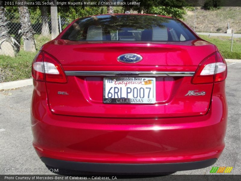 Bright Magenta Metallic / Charcoal Black Leather 2011 Ford Fiesta SEL Sedan