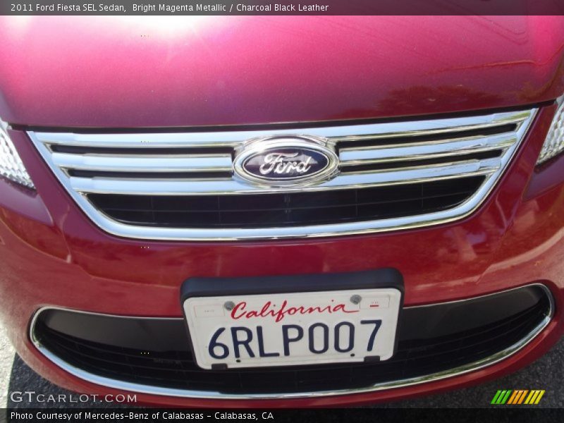 Bright Magenta Metallic / Charcoal Black Leather 2011 Ford Fiesta SEL Sedan