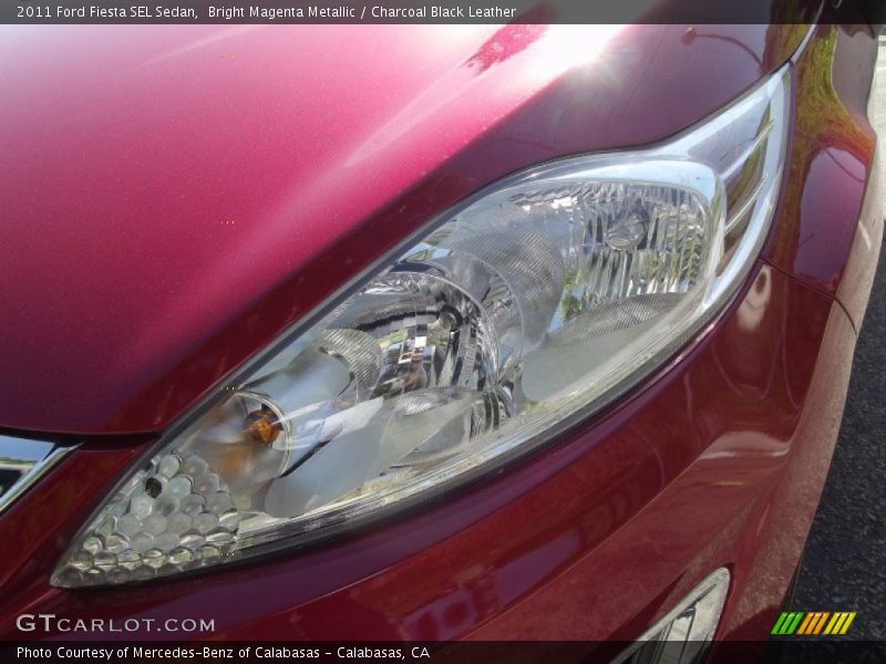 Bright Magenta Metallic / Charcoal Black Leather 2011 Ford Fiesta SEL Sedan