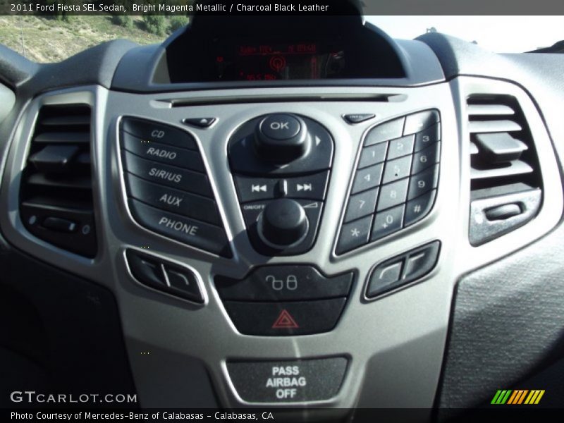 Bright Magenta Metallic / Charcoal Black Leather 2011 Ford Fiesta SEL Sedan