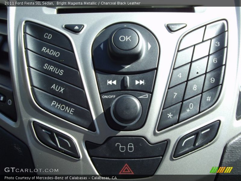 Bright Magenta Metallic / Charcoal Black Leather 2011 Ford Fiesta SEL Sedan