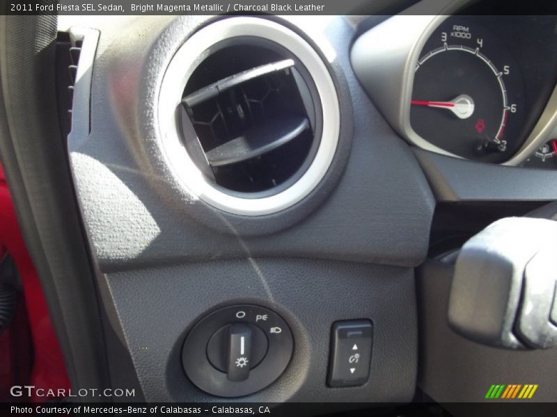 Bright Magenta Metallic / Charcoal Black Leather 2011 Ford Fiesta SEL Sedan