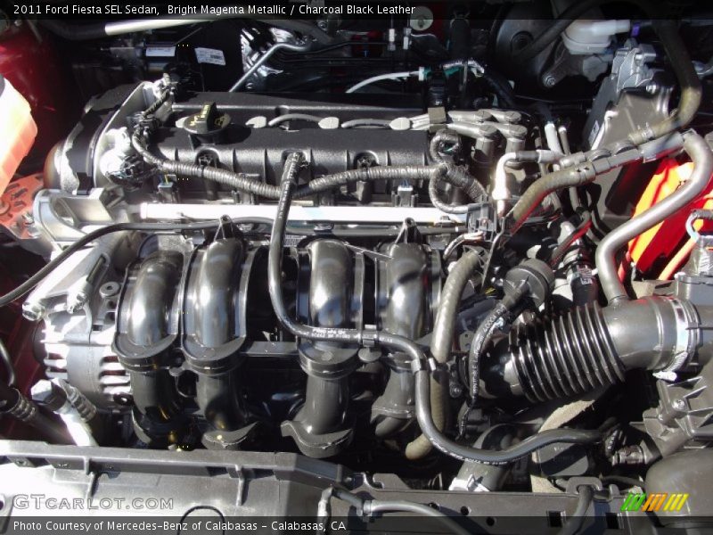 Bright Magenta Metallic / Charcoal Black Leather 2011 Ford Fiesta SEL Sedan
