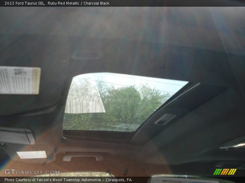 Ruby Red Metallic / Charcoal Black 2013 Ford Taurus SEL