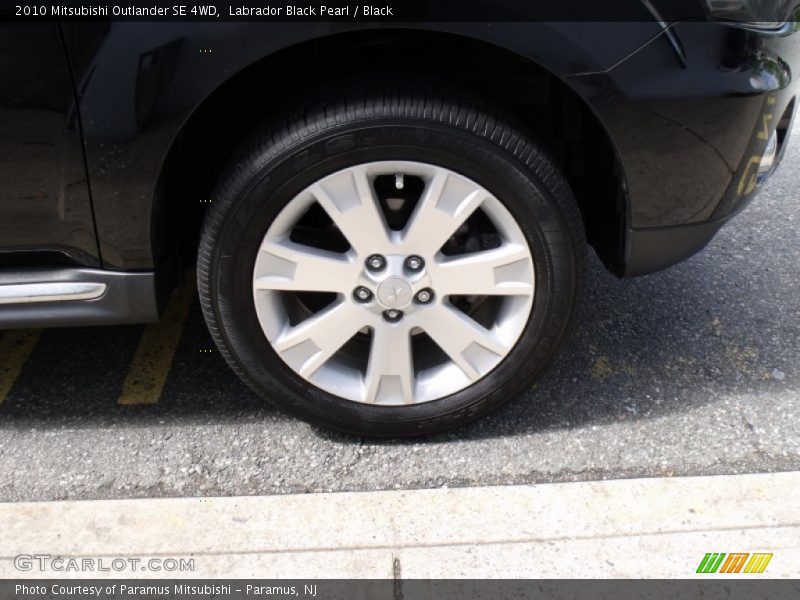 Labrador Black Pearl / Black 2010 Mitsubishi Outlander SE 4WD