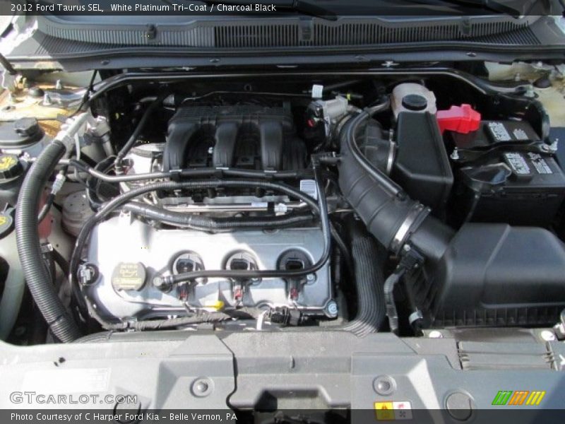 White Platinum Tri-Coat / Charcoal Black 2012 Ford Taurus SEL