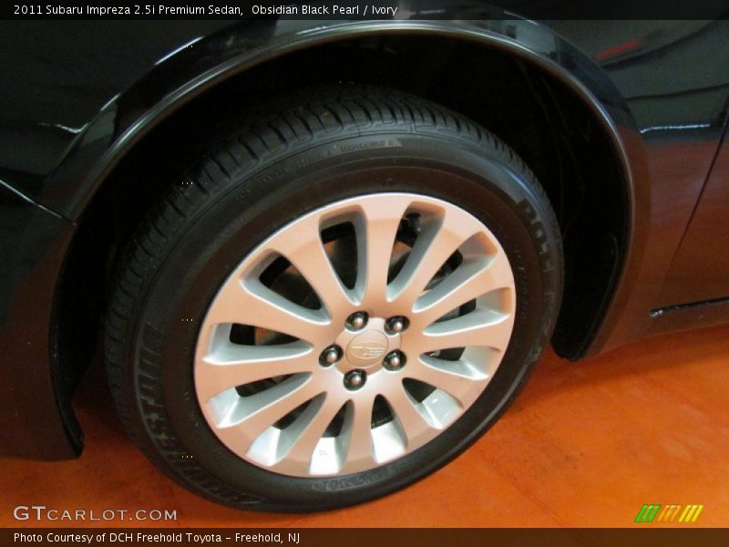 Obsidian Black Pearl / Ivory 2011 Subaru Impreza 2.5i Premium Sedan