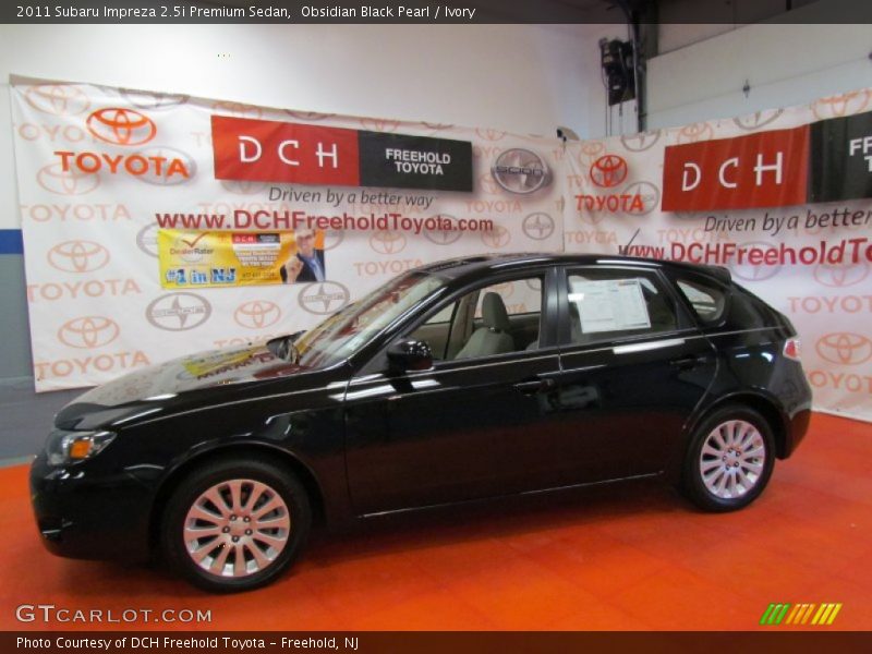 Obsidian Black Pearl / Ivory 2011 Subaru Impreza 2.5i Premium Sedan