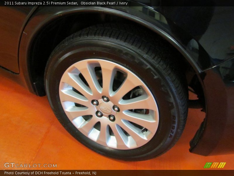 Obsidian Black Pearl / Ivory 2011 Subaru Impreza 2.5i Premium Sedan