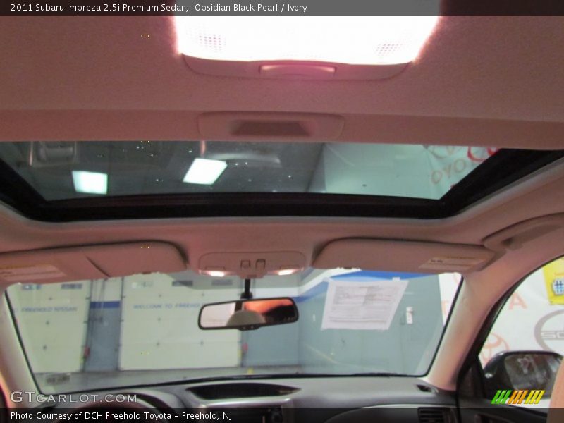 Obsidian Black Pearl / Ivory 2011 Subaru Impreza 2.5i Premium Sedan