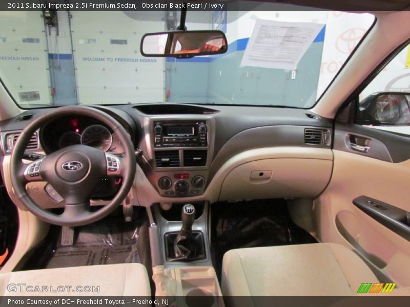 Obsidian Black Pearl / Ivory 2011 Subaru Impreza 2.5i Premium Sedan