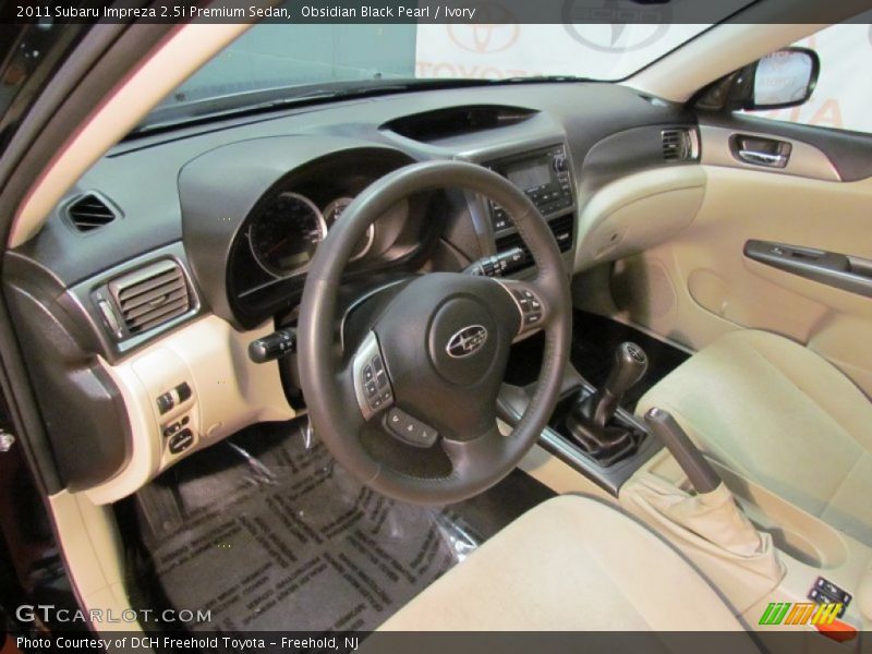 Obsidian Black Pearl / Ivory 2011 Subaru Impreza 2.5i Premium Sedan