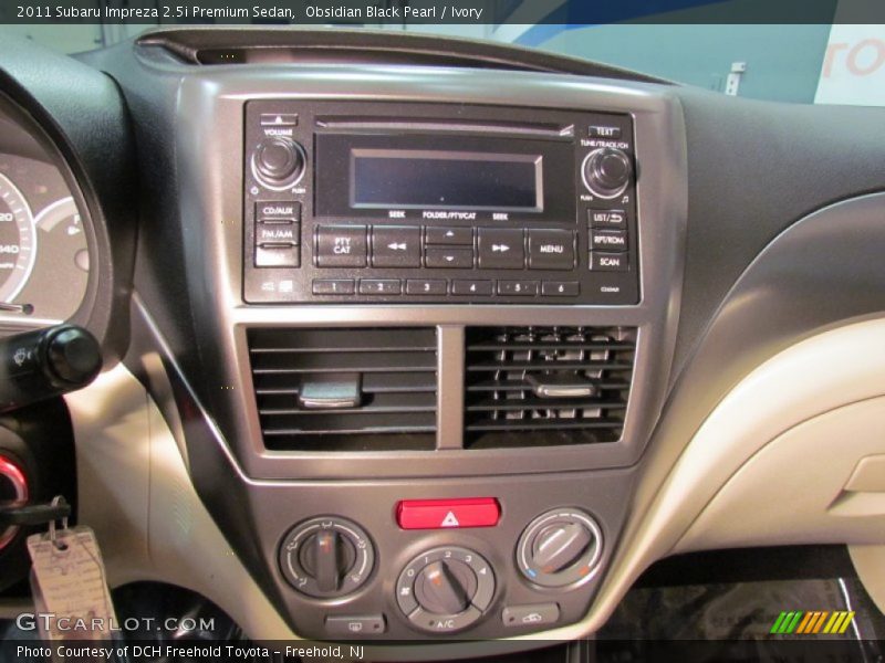 Obsidian Black Pearl / Ivory 2011 Subaru Impreza 2.5i Premium Sedan