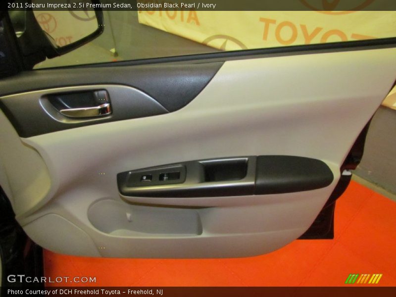 Obsidian Black Pearl / Ivory 2011 Subaru Impreza 2.5i Premium Sedan