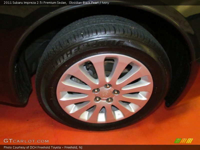 Obsidian Black Pearl / Ivory 2011 Subaru Impreza 2.5i Premium Sedan
