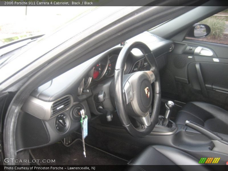 Black / Black 2006 Porsche 911 Carrera 4 Cabriolet