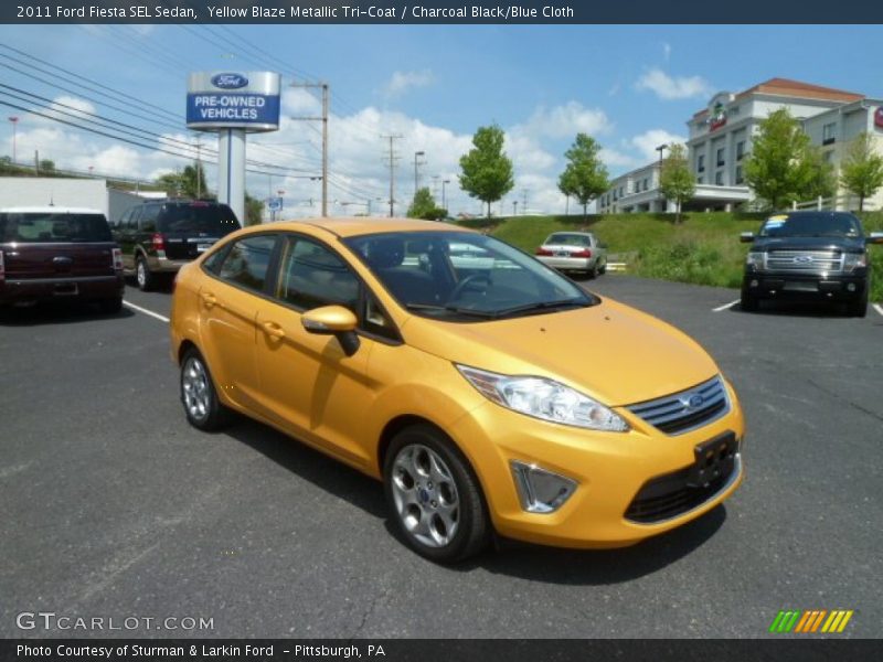 Yellow Blaze Metallic Tri-Coat / Charcoal Black/Blue Cloth 2011 Ford Fiesta SEL Sedan