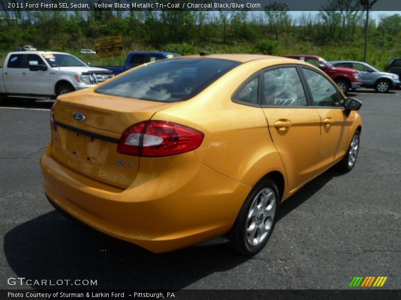 Yellow Blaze Metallic Tri-Coat / Charcoal Black/Blue Cloth 2011 Ford Fiesta SEL Sedan