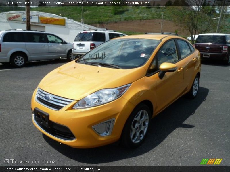 Yellow Blaze Metallic Tri-Coat / Charcoal Black/Blue Cloth 2011 Ford Fiesta SEL Sedan