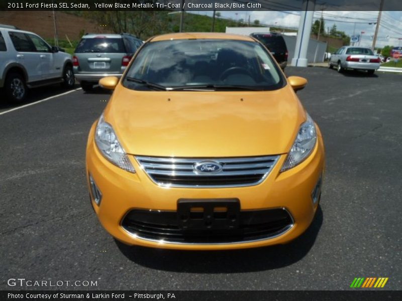 Yellow Blaze Metallic Tri-Coat / Charcoal Black/Blue Cloth 2011 Ford Fiesta SEL Sedan