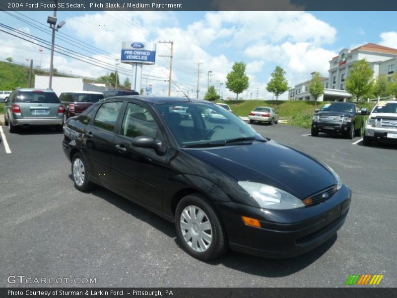 Pitch Black / Medium Parchment 2004 Ford Focus SE Sedan