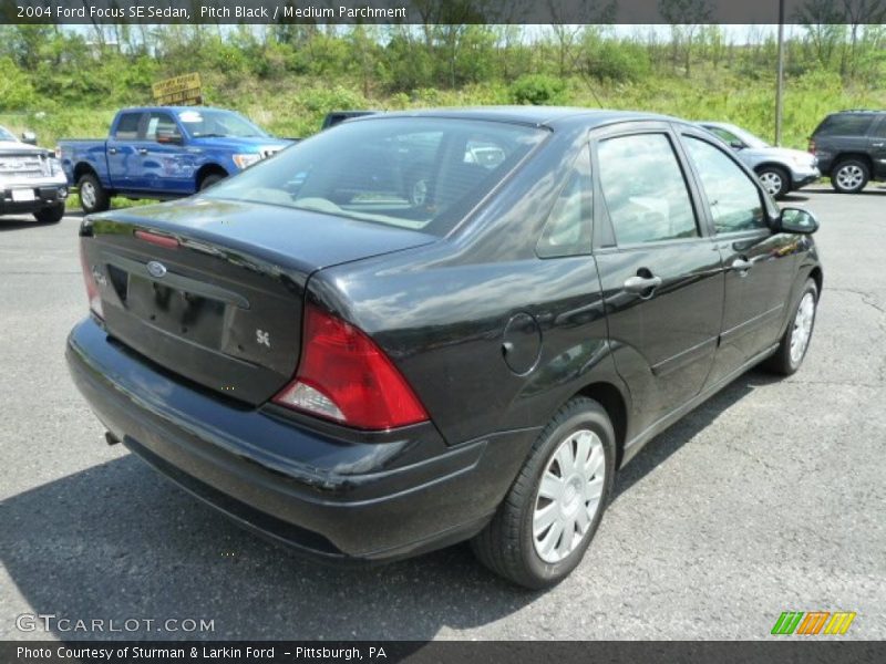 Pitch Black / Medium Parchment 2004 Ford Focus SE Sedan