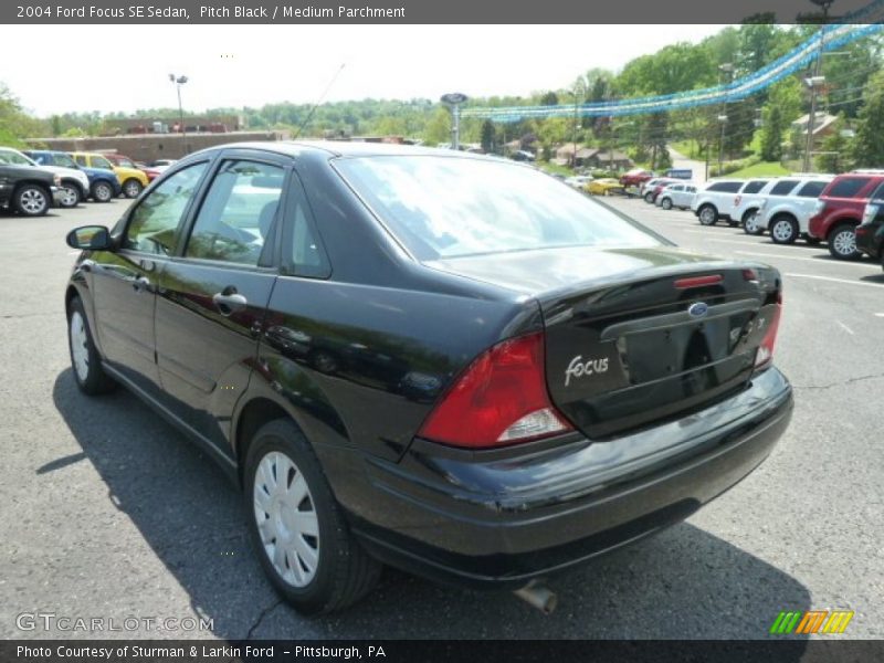 Pitch Black / Medium Parchment 2004 Ford Focus SE Sedan
