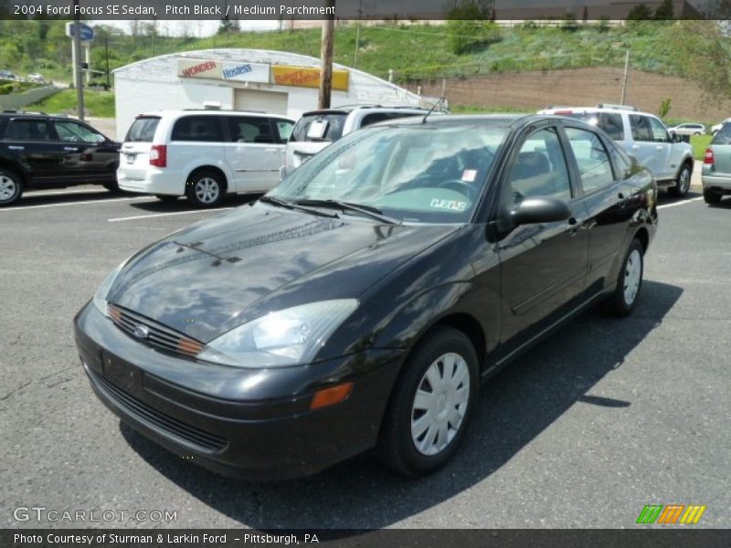 Pitch Black / Medium Parchment 2004 Ford Focus SE Sedan