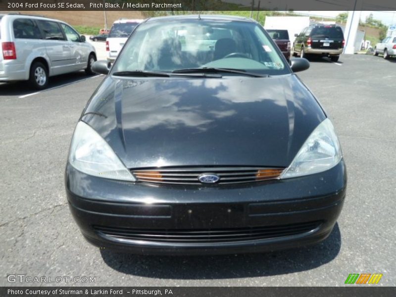 Pitch Black / Medium Parchment 2004 Ford Focus SE Sedan
