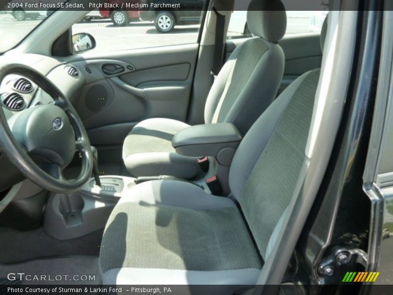 Pitch Black / Medium Parchment 2004 Ford Focus SE Sedan