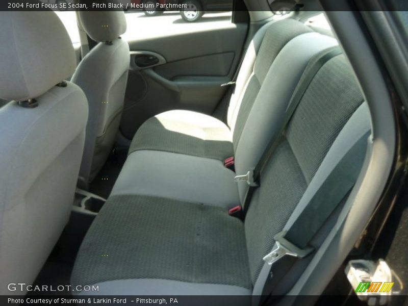 Pitch Black / Medium Parchment 2004 Ford Focus SE Sedan