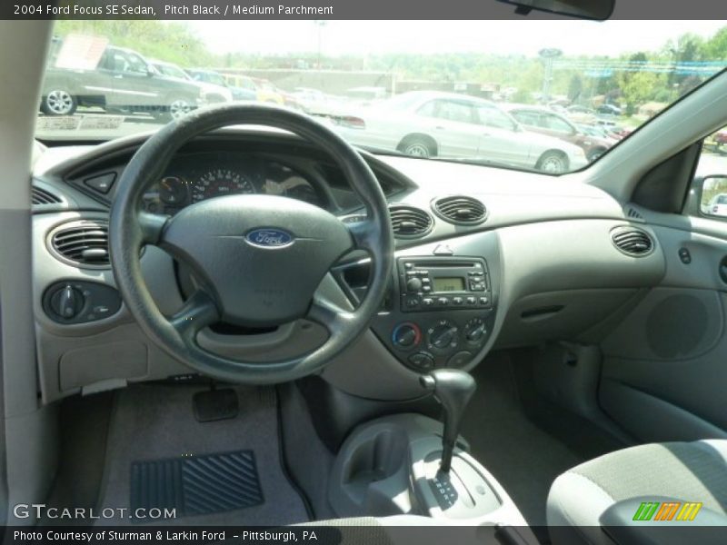 Pitch Black / Medium Parchment 2004 Ford Focus SE Sedan