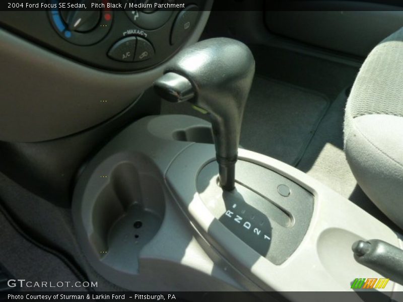 Pitch Black / Medium Parchment 2004 Ford Focus SE Sedan