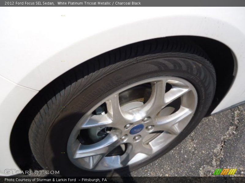 White Platinum Tricoat Metallic / Charcoal Black 2012 Ford Focus SEL Sedan