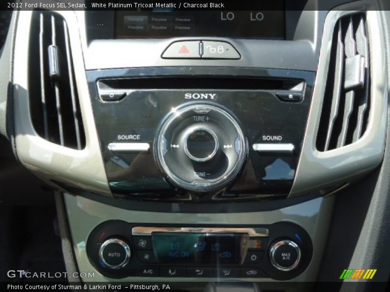 White Platinum Tricoat Metallic / Charcoal Black 2012 Ford Focus SEL Sedan