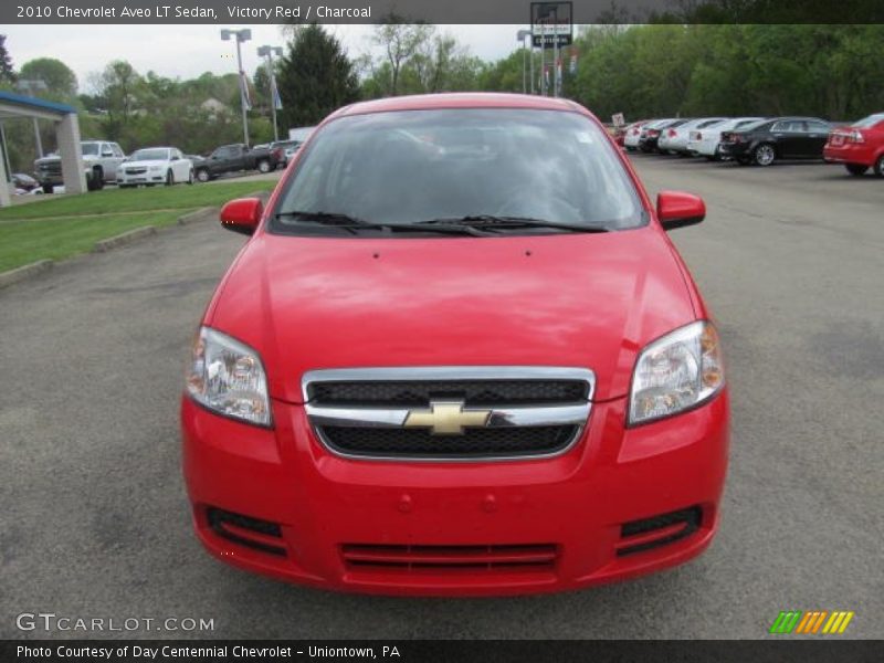 Victory Red / Charcoal 2010 Chevrolet Aveo LT Sedan
