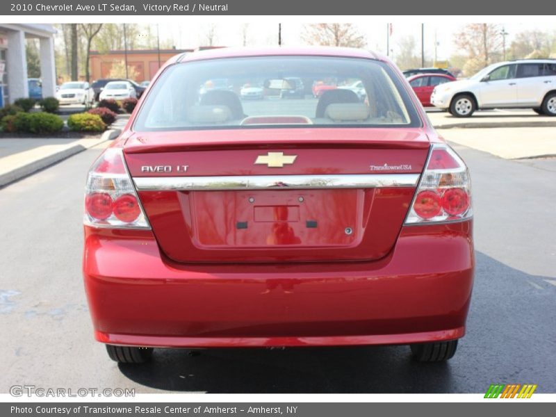 Victory Red / Neutral 2010 Chevrolet Aveo LT Sedan