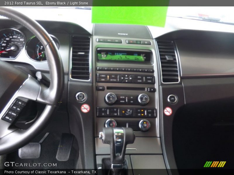 Ebony Black / Light Stone 2012 Ford Taurus SEL