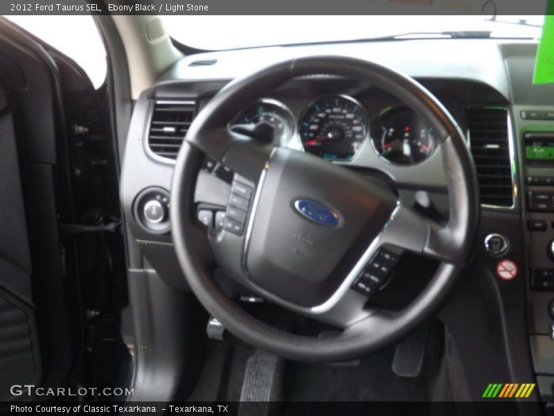 Ebony Black / Light Stone 2012 Ford Taurus SEL