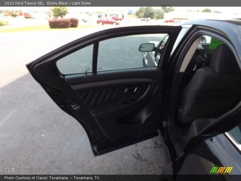 Ebony Black / Light Stone 2012 Ford Taurus SEL