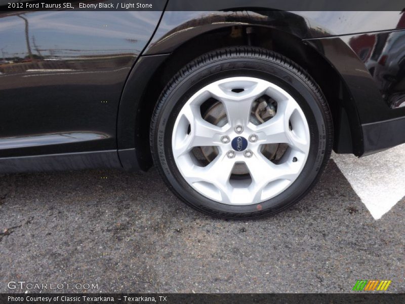 Ebony Black / Light Stone 2012 Ford Taurus SEL