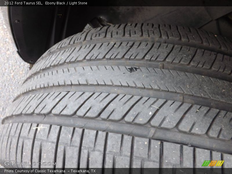 Ebony Black / Light Stone 2012 Ford Taurus SEL