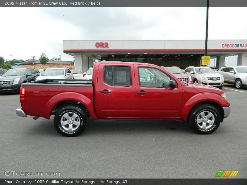 Red Brick / Beige 2009 Nissan Frontier SE Crew Cab
