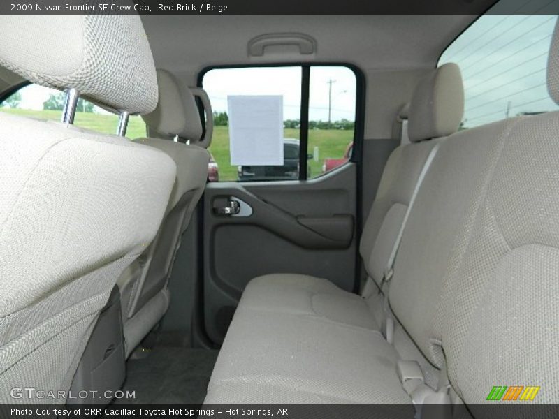 Red Brick / Beige 2009 Nissan Frontier SE Crew Cab