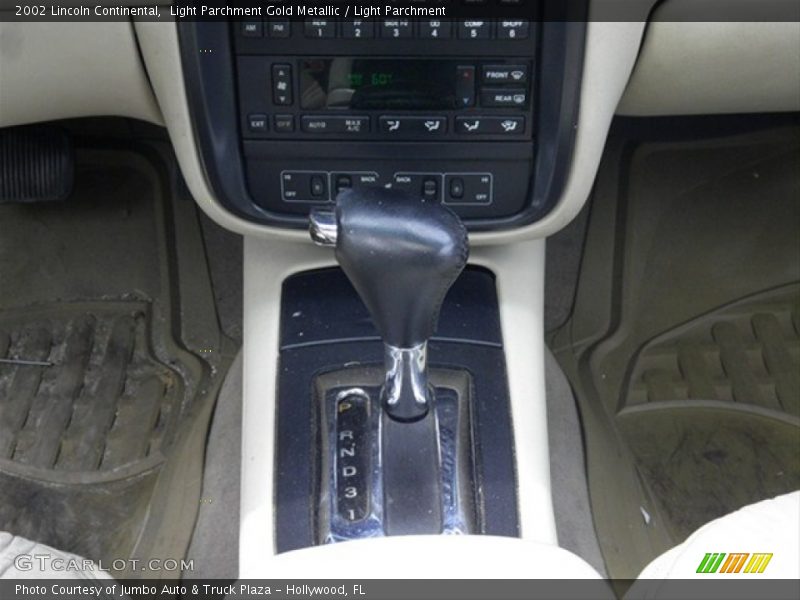Light Parchment Gold Metallic / Light Parchment 2002 Lincoln Continental