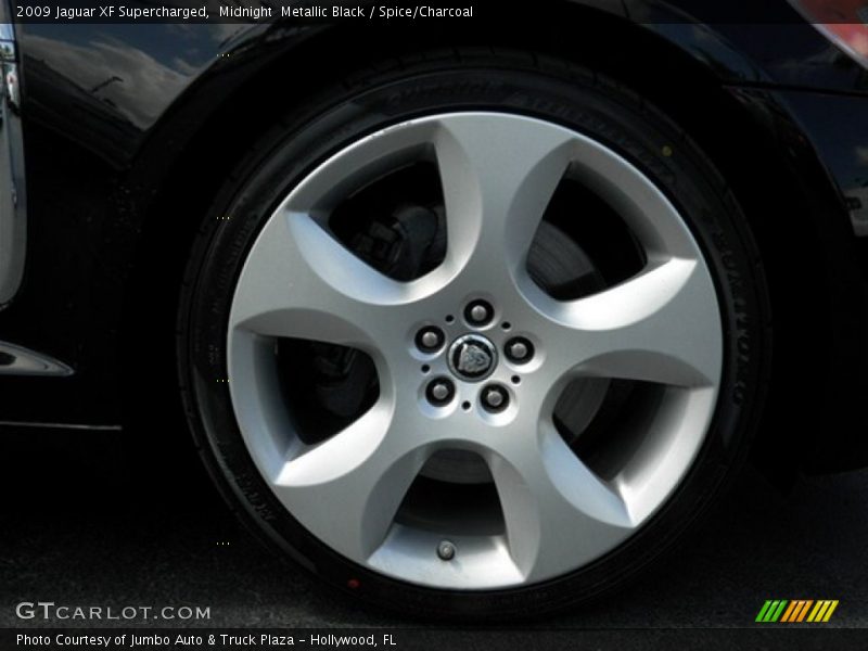 Midnight  Metallic Black / Spice/Charcoal 2009 Jaguar XF Supercharged