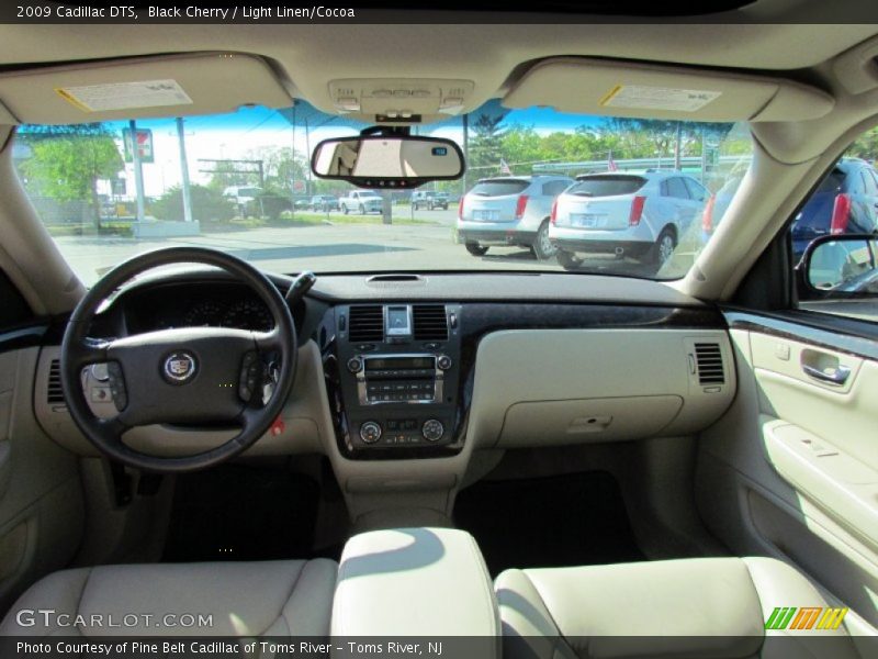 Black Cherry / Light Linen/Cocoa 2009 Cadillac DTS