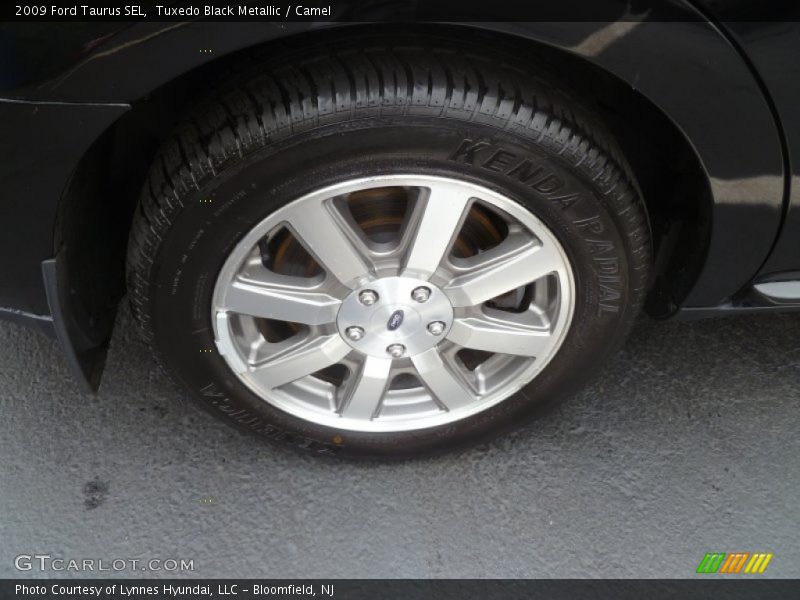 Tuxedo Black Metallic / Camel 2009 Ford Taurus SEL