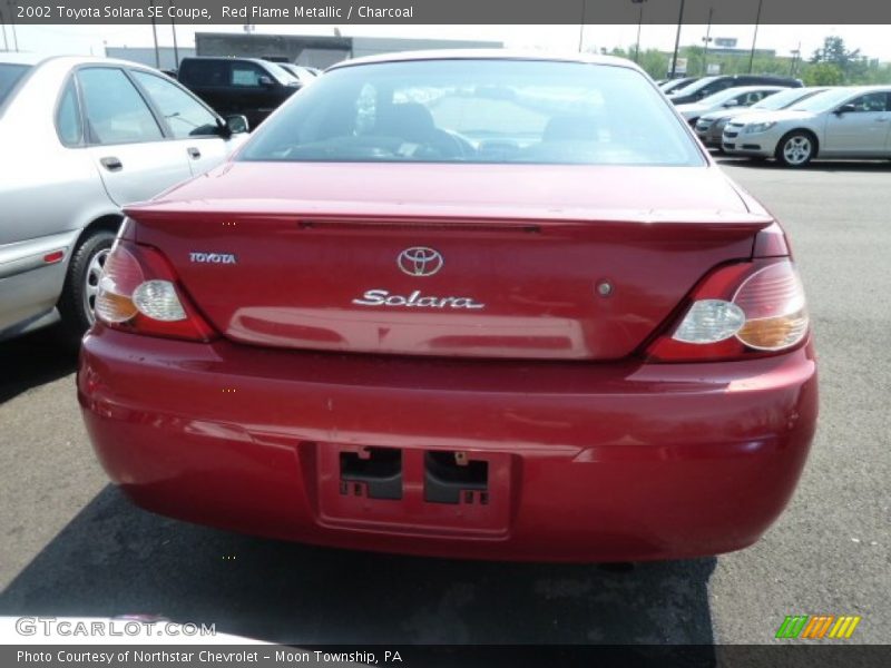 Red Flame Metallic / Charcoal 2002 Toyota Solara SE Coupe